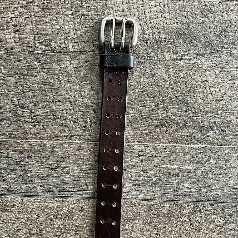 Brown Leather Belt with silver Buckle. 37 inches.